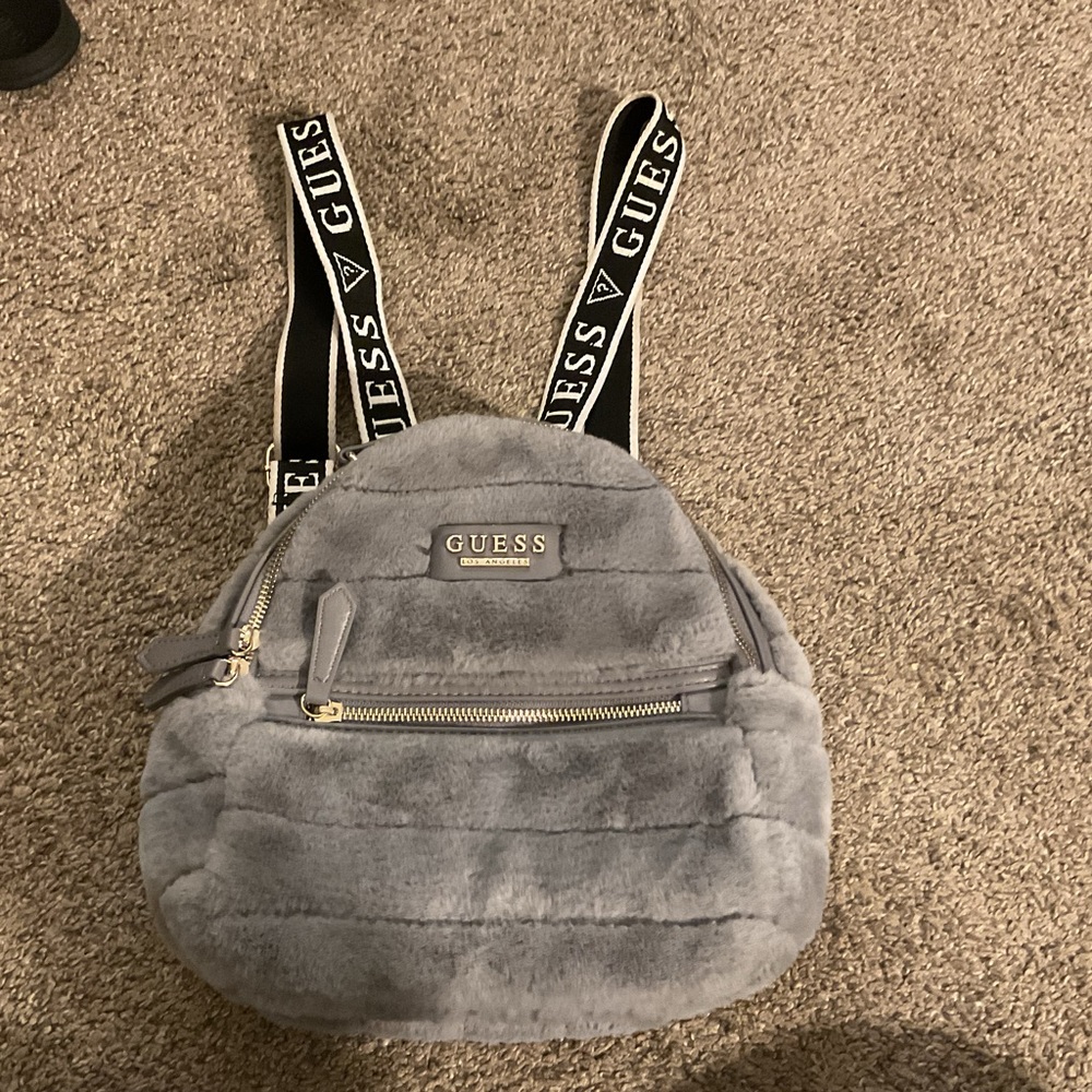 Women’s mini guess fuzzy gray backpack.